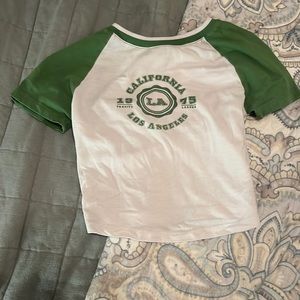 I am selling a white and green crop top